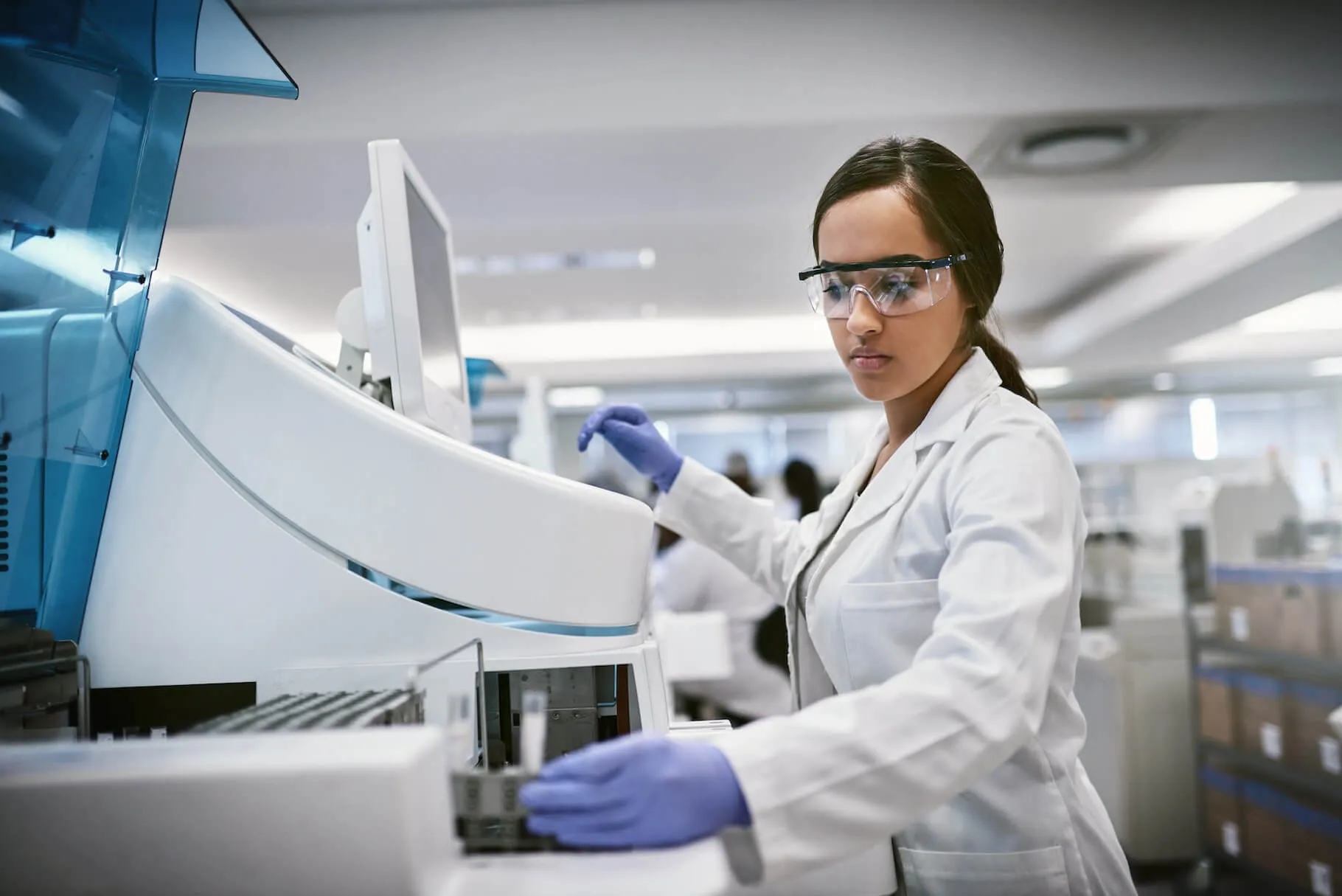 Lab analyst assessing samples