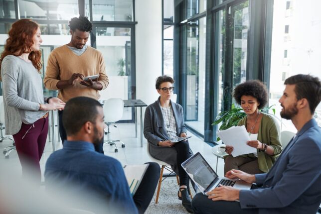 Young creatives having a meeting in a modern office