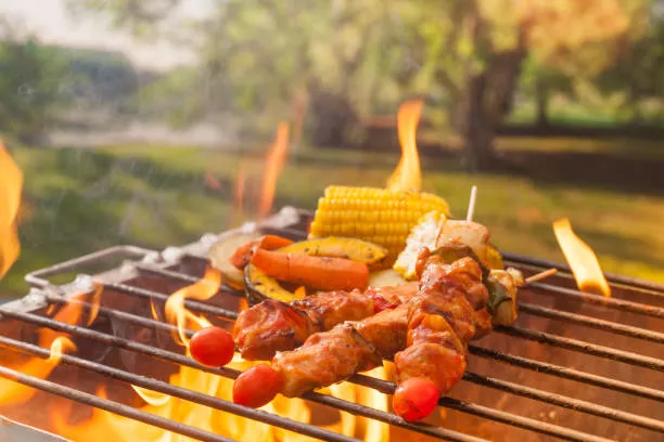 Barbecue in garden at summer